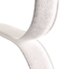 A close-up of a white hook and loop fastener, showing the detailed texture of the adhesive surface.